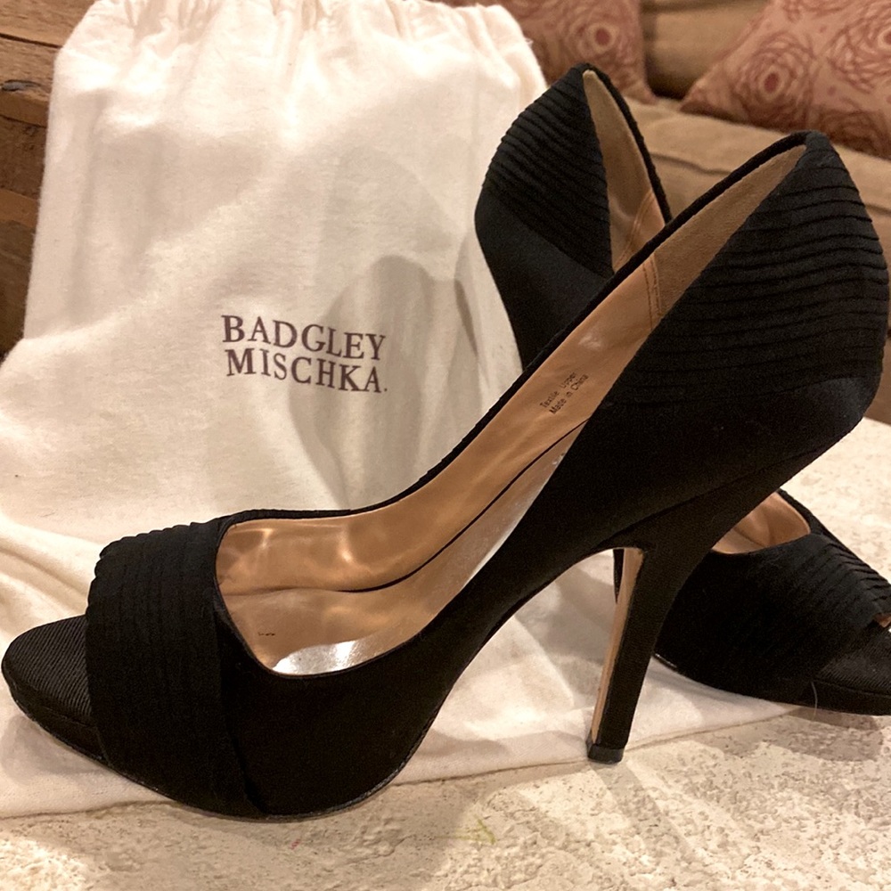 Badgley Mischka black satin 7 1/2 pumps with leather sole and 3.5” heel.